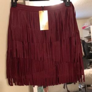Leather fringe mini skirt